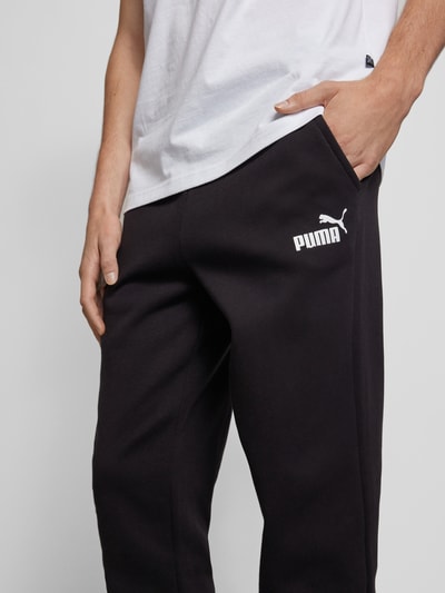 PUMA PERFORMANCE Spodnie dresowe o kroju relaxed fit z nadrukiem z logo Czarny 3