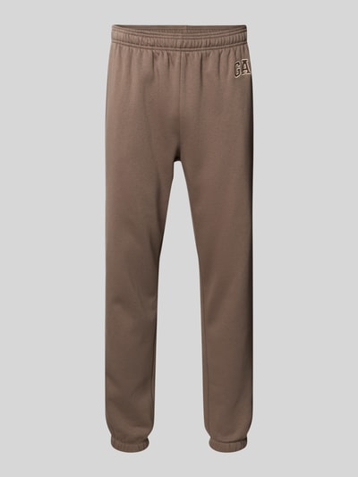 Produktfoto, Sweatpants mit Eingrifftaschen von GAP, mieszanka bawełny, krój regular fit, elastyczny pas, logo, długość wewnętrzna nogawki 72 cm w rozmiarze M, brązowy odcień, gładka tekstura