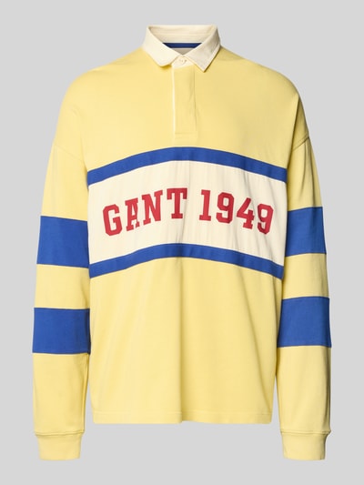 Produktfoto, Relaxed Fit Longsleeve mit Logo-Print von Gant, żółty, biały i niebieski, czysta bawełna, krój relaxed fit, polówkowy kołnierzyk, elastyczne mankiety, długość tyłu 79 cm, długość rękawa 64 cm