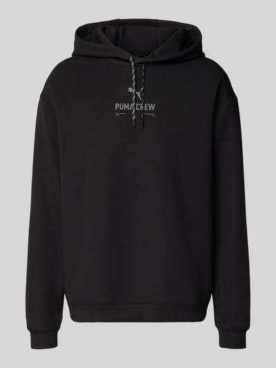 Produktfoto, Hoodie mit Logo von PUMA PERFORMANCE aus schwarzem Material-Mix mit Lyocell-Anteil, Relaxed Fit, Vorderansicht