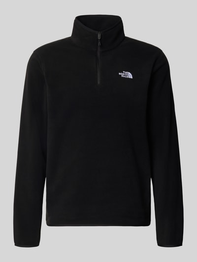 Produktfoto, Fleecepullover mit Troyer-Kragen Modell 'GLACIER' van The North Face, zwarte fleece, recht pasvorm, labelstitching, elastische boorden, ruglengte 70 cm, mouwlengte 72 cm, heren