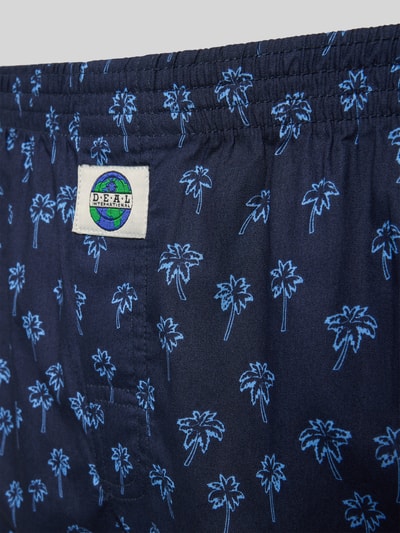 Produktfoto, Boxershorts aus reiner Baumwolle Modell 'Palme' von Deal, dunkelblau mit hellblauen Palmen, elastischer Bund, Label-Detail