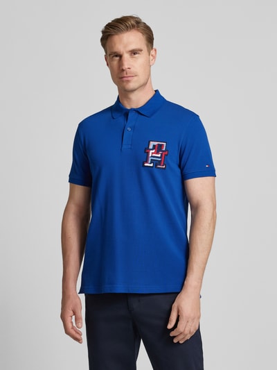 Tommy Hilfiger Koszulka polo o kroju regular fit z naszywką z logo Królewski niebieski 4