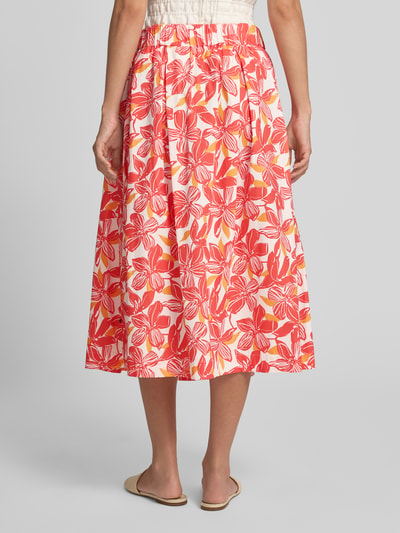 Frauenmodel trägt Ausgestellter Midi-Rock aus Baumwoll-Mix von ROBE LÉGÈRE mit buntem Blumenmuster in Rot und Rosa, Ganzkörperansicht Rückansicht. Damen Midi-Rock von ROBE LÉGÈRE.