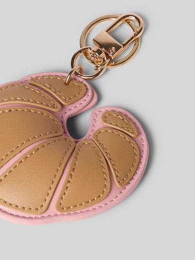 Produktfoto, Schlüsselanhänger mit Karabinerhaken Modell 'My Croissant' von Seidenfelt, braun und rosa, Kontrastbesatz, strukturierte Oberfläche