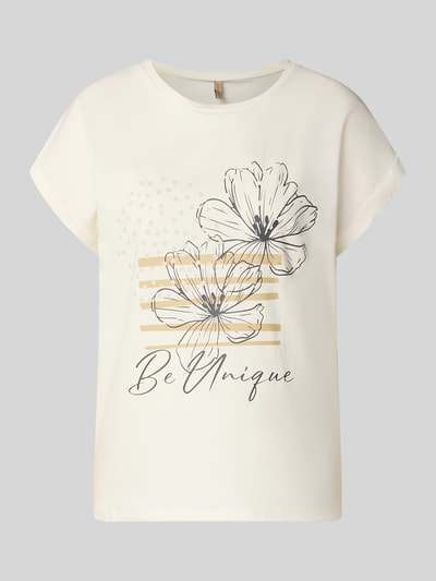 Produktfoto, T-Shirt mit fixiertem Ärmelaufschlag Modell 'RINA' od Soyaconcept, bawełniany miks z dodatkiem stretchu, prosty krój, okrągły dekolt, nadruk z motywem, kremowa kolorystyka, gładka tekstura, szerokość przy rozmiarze S: 63 cm.