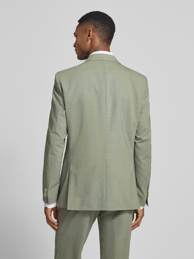 Męski model nosi Slim Fit 2-Knopf-Sakko mit Pattentaschen Modell 'Paul SV' von CG - Club of Gents w jasnoszarym kolorze, tkanina o gładkiej strukturze, widoczne klapy, krój slim fit, długość tyłu w rozmiarze 50: 77 cm, szerokość ramion w rozmiarze 50: 43 cm, długość rękawa w rozmiarze 50: 64 cm, całkowity widok z tyłu.