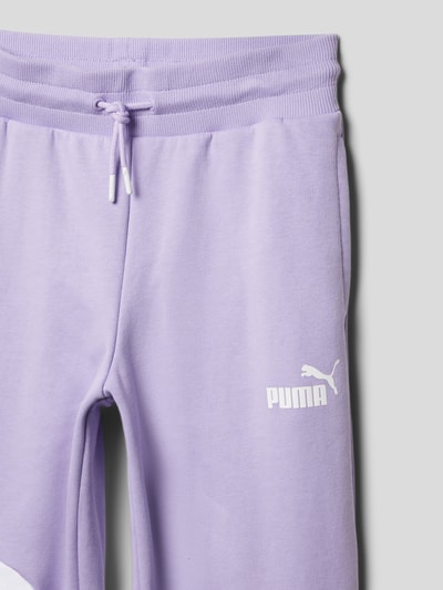 Puma Spodnie dresowe z nadrukiem z logo model ‘POWER’ Jasnofioletowy 2