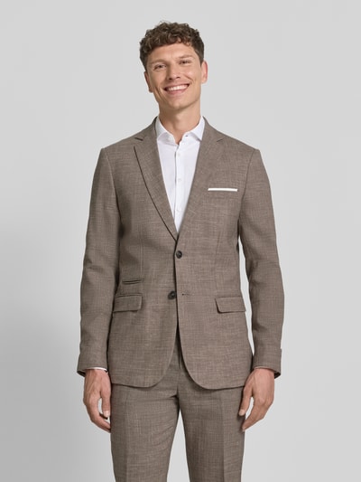 Männermodel trägt Slim Fit Anzugsakko mit Woll-Anteil Modell 'SLIM-OASIS' von SELECTED HOMME, Melange-Optik, Twill, Ganzkörperansicht von vorne.