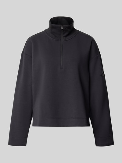 Produktfoto, Regular Fit Sweatshirt mit Baumwoll-Anteil von adidas Sportswear in Schwarz mit glatter Textur vor grauem Hintergrund
