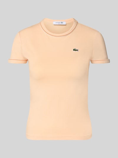Produktfoto, Slim Fit T-Shirt aus Baumwoll-Mix von Lacoste in Uni-Optik mit Logo-Stitching, Paspelbesatz, kurzarm, beige Farbe, glatte Textur