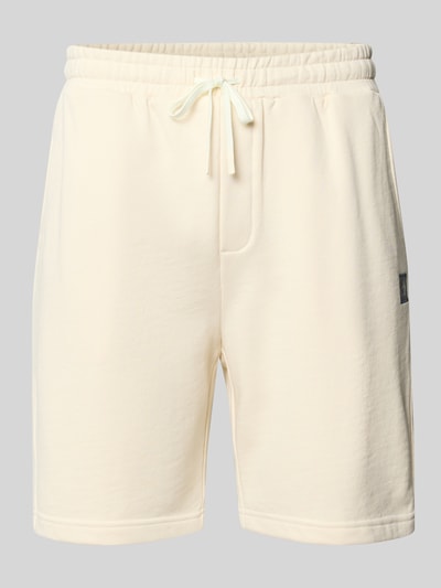 Produktfoto, Shorts mit Label-Badge und elastischem Bund von Scotch & Soda aus Reine Baumwolle, Regular-Fit, cremefarbene glatte Oberfläche