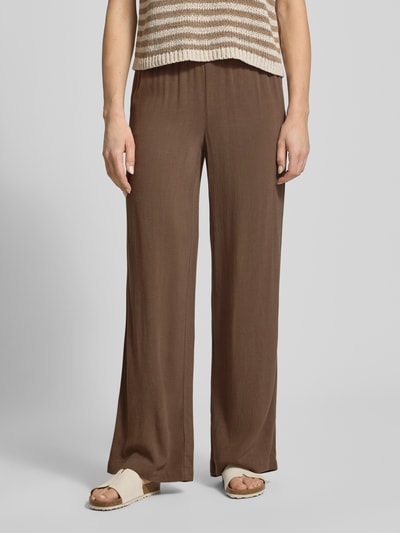 Frauenmodel trägt Regular Fit Weite Hose aus Viskose-Leinen-Mix Modell 'VIVA-GULIA' von Selected Femme, Optik: Unifarben, Tunnelzug, elastischer Bundabschluss, seitliche Eingrifftaschen, Materialverarbeitung: Flammgarn, Ganzkörperansicht von vorne.
