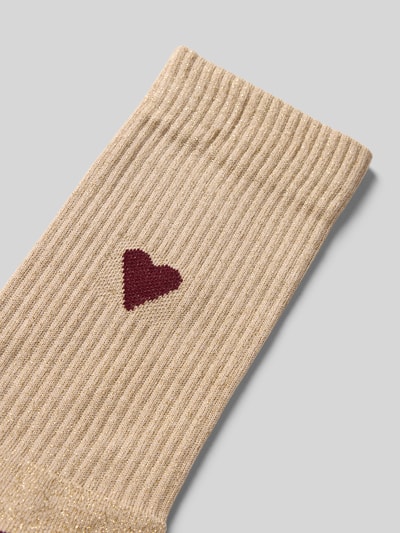 Produktfoto, Socken mit Label-Print von Unio aus Baumwoll-Metall-Mix mit Stretch-Anteil, beige Farbe, gerippter Abschluss, körpernaher Schnitt