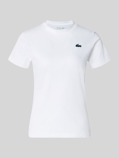 Produktfoto, białe Slim Fit T-Shirt aus Baumwoll-Mix von Lacoste Sport, jednolita optyka, logo, okrągły dekolt, bawełniana mieszanka