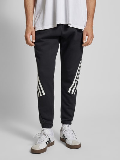 ADIDAS SPORTSWEAR Spodnie dresowe o kroju regular fit z charakterystycznymi dla marki paskami Czarny 4