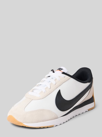 Produktfoto, Sneaker mit Label-Applikation Modell 'Pacific' von Nike, abgerundete Form, Schnürverschluss, strukturierte Sohle, weiß-schwarz-beige, Absatzhöhe 2 cm, Schafthöhe 8 cm, Schaftweite 9 cm