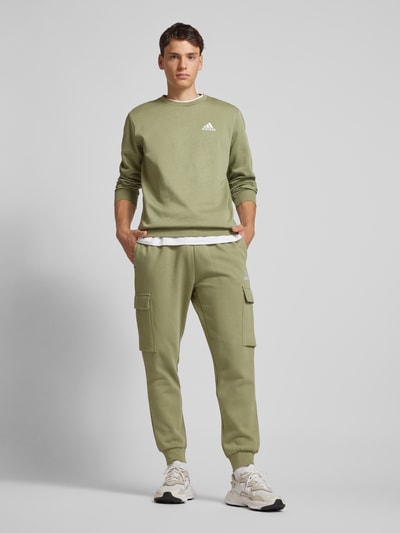 ADIDAS SPORTSWEAR Sweatpants met opgestikte zakken, model 'FELCZY' Olijfgroen - 1