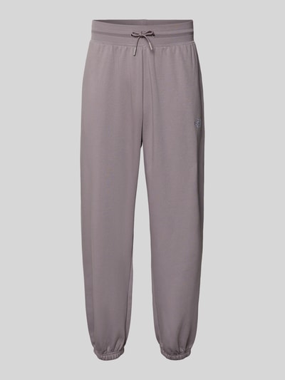 Produktfoto, Sweatpants mit Logo-Stitching von The North Face in Grau, Baumwoll-Mix, Relaxed-Fit, elastischer Bund mit Kordelzug, elastische Abschlüsse, Innenbeinlänge bei Größe M 68 cm