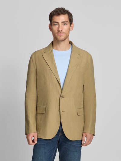 Mannelijk model draagt Regular Fit Anzugsakko aus reinem Leinen van Polo Ralph Lauren in effen kleuren, materiaal gevlamd garen, reverskraag, 2-knoopsluiting, klepzakken en borstzak, lange mouw met kissing buttons, binnenzakken, rompzoom met vaste zijsplitten, ganzkörperansicht van voren.