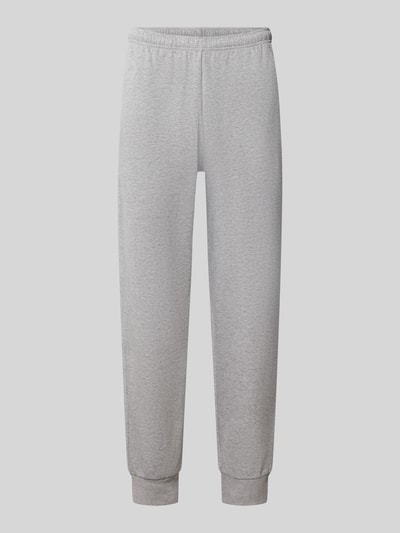 Productfoto, Relaxed Fit Sweatpants aus katoenmix Model 'EVOLUTION' van The North Face, Heren sweatpants, elastische band met tunnelkoord, zijsteekzakken, binnenbeenlengte maat M 75 cm, lichtgrijs, zachte textuur