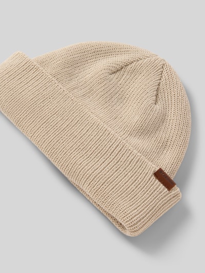 Produktfoto, Strickmütze mit Label-Detail Modell 'PORTSIDE FISHERMAN' von Columbia, mieszanka materiałów z dodatkiem streczu, szeroki brzeg, detal z logo, kolor beżowy, wyrazista tekstura dzianiny