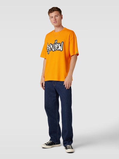 REVIEW Oversized T-shirt met graffitiprint Oranje - 1