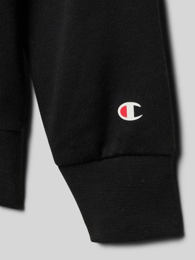Detailopname, Regular Fit Sweatjacke mit Logo-Stitching van CHAMPION, zwart katoenmix, elastische boorden, logo op mouw.