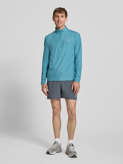 New Balance Bluza o kroju regular fit z kołnierzem zapinanym Petrol 1