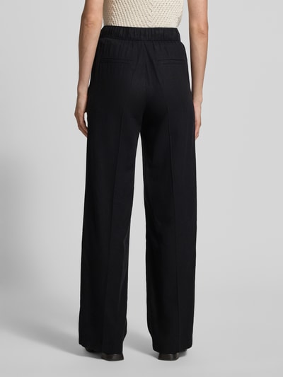 Vrouwenmodel draagt Relaxed Fit Weite Hose aus Leinen-Viskose-Mix van s.Oliver RED LABEL, look: effen, bandplooi, high waist, boord elastisch met tunnelkoord, steekzakken, achterzak, mix van linnen en viscose, Ganzkörperansicht Rückansicht.