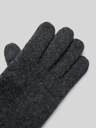 Produktfoto, Handschuhe aus reiner Schurwolle von Roeckl in dunklem Grau, Strick-Optik, Label-Detail in metallic, weiche Textur