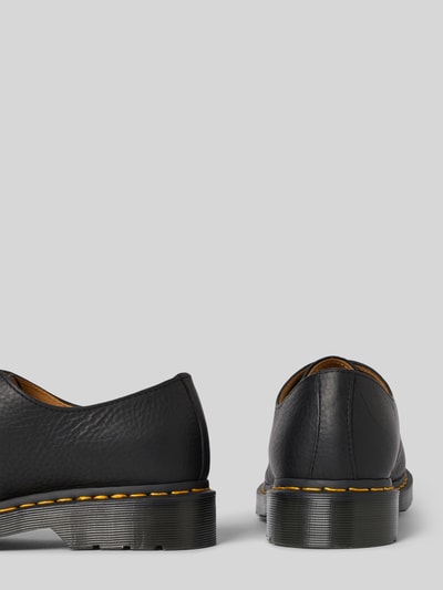 Produktfoto, Herren Schnürschuhe aus Echtleder Modell 'Eye' von Dr. Martens, Strukturmuster, profilierte Sohle, schwarze Farbe, Detailaufnahme Rückansicht