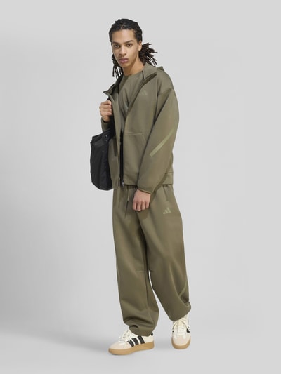 adidas Sportswear Regular Fit Sweatjacke mit Baumwoll-Anteil Oliv 1
