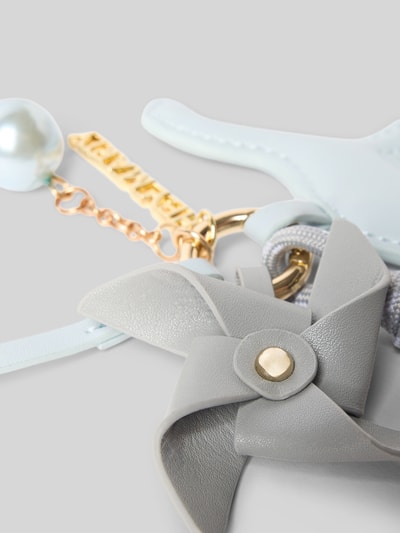 Produktfoto, Schlüsselanhänger mit Karabinerverschluss Modell 'Dino' von Hey Marly in Grau und Gold, Zierperle, Logo-Detail, Zier-Anhänger, Nahaufnahme, Damen Schlüsselanhänger