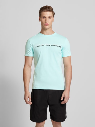 Calvin Klein Jeans T-shirt z nadrukiem z logo model ‘MIXED INSTITUTIONAL’ Morski 4