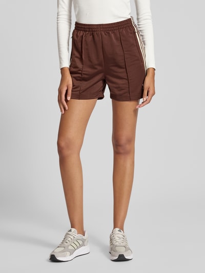 adidas Originals Szorty o kroju relaxed fit z lampasami model ‘Firebird’ Średniobrązowy 4