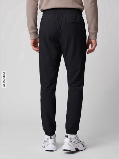 Under Armour Tapered Fit Trainingshose mit Logo Print Modell 'Vibe' Black 5
