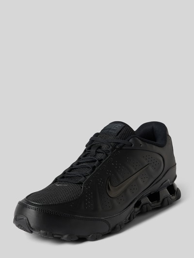 Produktfoto, Sneaker mit Logo-Detail Modell 'REAX 8 NSW SL' von Nike, schwarzes Mesh und Glattleder, strukturierte Sohle, Herren Sneaker