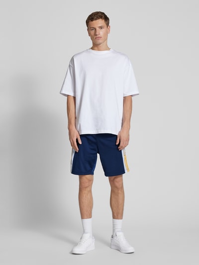 adidas Originals Szorty treningowe o kroju regular fit z kieszeniami zapinanymi na zamek błyskawiczny Ciemnoniebieski 1