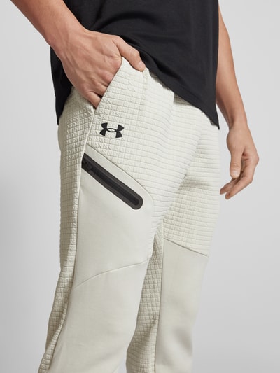 Under Armour Relaxed Fit Sweatpants mit Reißverschlusstasche Offwhite 3