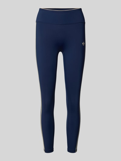 Produktfoto, dunkelblaue Slim Fit Sport-Leggings mit CLIMACOOL Technologie von adidas adidas Training, helle Seitenstreifen, glatte Oberfläche.