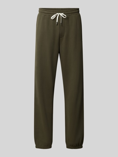 Produktfoto, Sweatpants mit elastischem Bund und Tunnelzug von Scotch & Soda, reine Baumwolle, Regular Fit, Logo sichtbar, olivgrün, glatte Textur