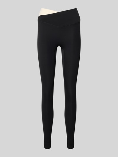 Produktfoto, High Rise Leggings in asymmetrischem Look von P.E Nation, schwarz, figurbetont, elastischer Bund, Material-Mix mit Stretch-Anteil.