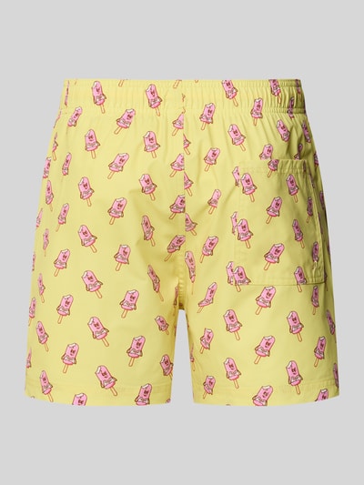 Produktfoto, spodenki kąpielowe o kroju regular fit z wzorem na całej powierzchni model 'MAUI VIBES NOVELTY' od Jack & Jones, elastyczny pas, żółte z różowymi nadrukami, wyrazista faktura