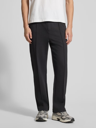 Mannenmodel draagt Regular Fit Sweatpants uit katoenmix model 'JT_Member Hurley' van BOSS Green, uni, tunnelkoord, label stitching, fixeerde vouwen, elastische tailleband, steekzakken, sweatmateriaal, vooraanzicht volledige lichaamsopname.
