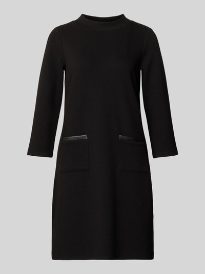 Produktfoto, Minikleid mit 3/4-Ärmel von More & More, Schwarz, Material-Mix mit Baumwoll-Anteil, taillierter Schnitt, gerippter Rundhalsausschnitt, Eingrifftaschen, glatte Struktur, schlichte Optik