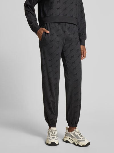 HUGO Spodnie dresowe o kroju regular fit z mieszanki bawełny model ‘LOKKY’ Czarny 4
