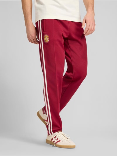 adidas Originals Spodnie dresowe w kroju regular fit z dodatkiem bawełny Bordowy 4