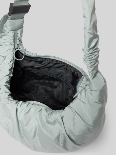 Produktfoto, Umhängetasche mit verstellbarem Schulterriemen von Damen, unifarbene Optik, Reißverschluss, Netzfächer und elastische Raffung