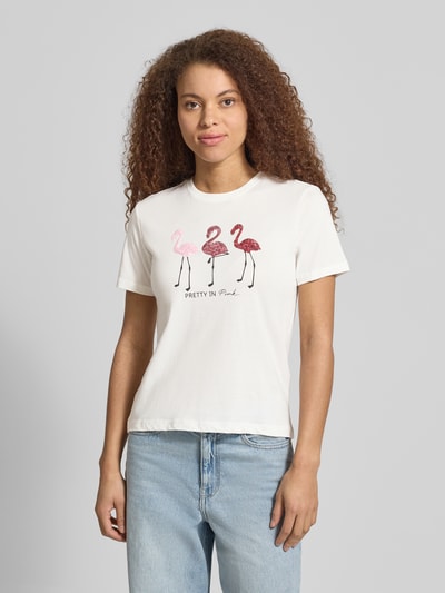 Frauenmodel trägt Damen T-Shirt von Only, Modell 'Regular Fit T-Shirt aus reiner Baumwolle Modell KITA', Optik: Unifarben, Passform: Regular-Fit, Motiv-Print mit Pailletten, Rundhals, Kurzarm, Materialverarbeitung: Jersey, Material: Reine Baumwolle, Ganzkörperansicht von vorne.